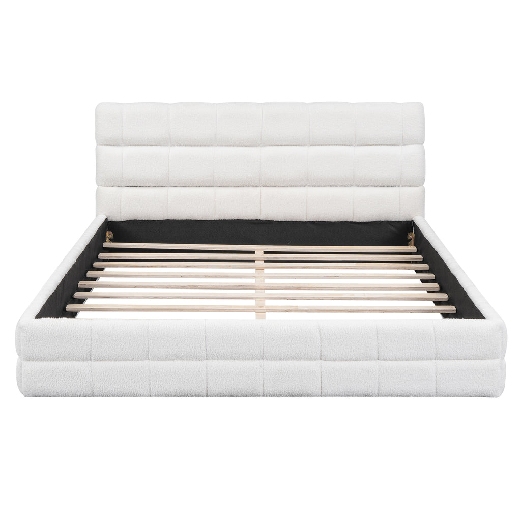 Queen platform bed by Anthony & Home with white velvet upholstery and wood frame, featuring a modern and elegant design.