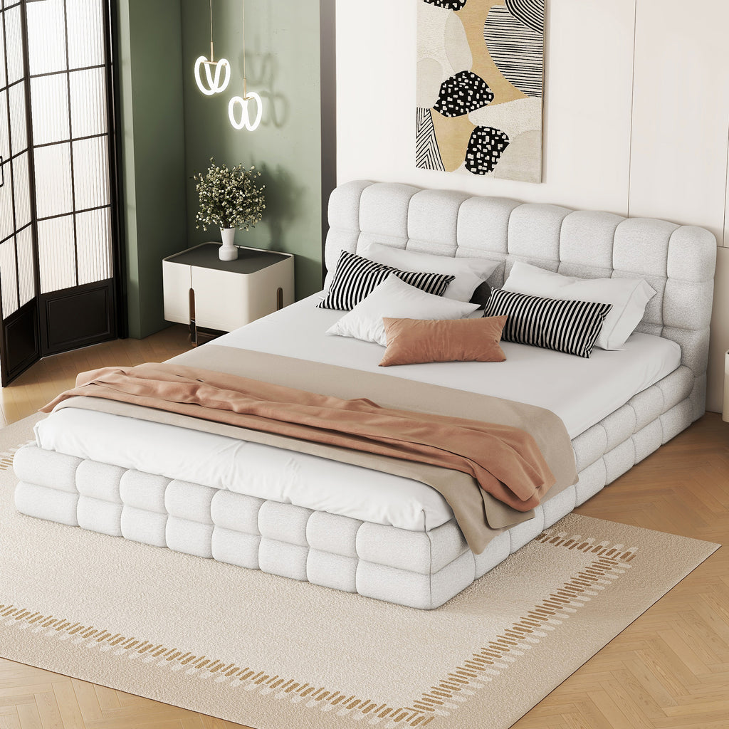 Queen platform bed by Anthony & Home with white velvet upholstery and wood frame, showcasing a modern bedroom design.