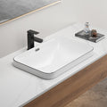 Anthony & Home porcelain undermount sink with smooth white ceramic finish and sleek oval shape for modern bathroom decor.