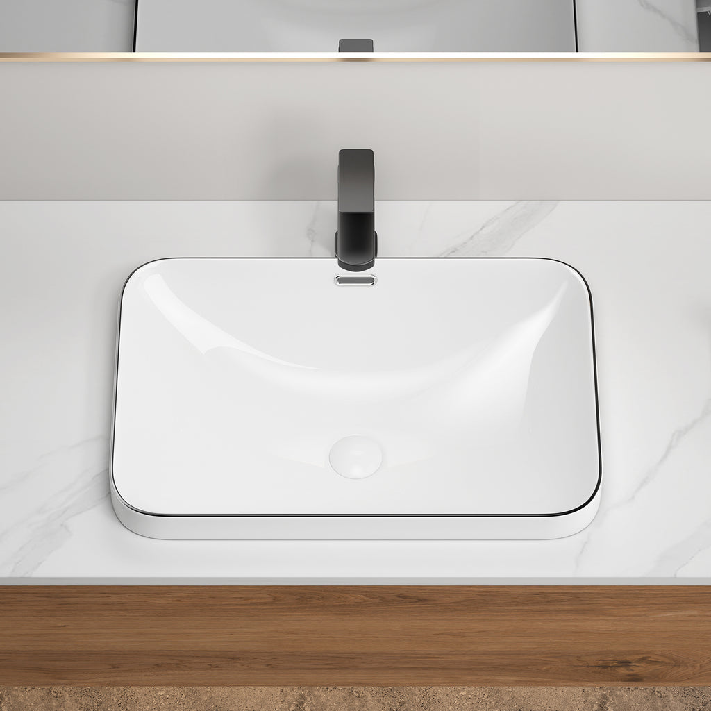 Porcelain undermount sink from Anthony & Home with smooth white finish and clean, modern design for bathroom or kitchen use.