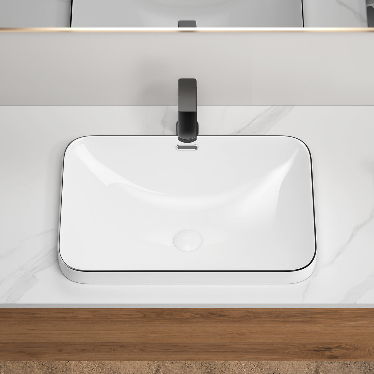 Porcelain undermount sink from Anthony & Home with smooth white finish and clean, modern design for bathroom or kitchen use.