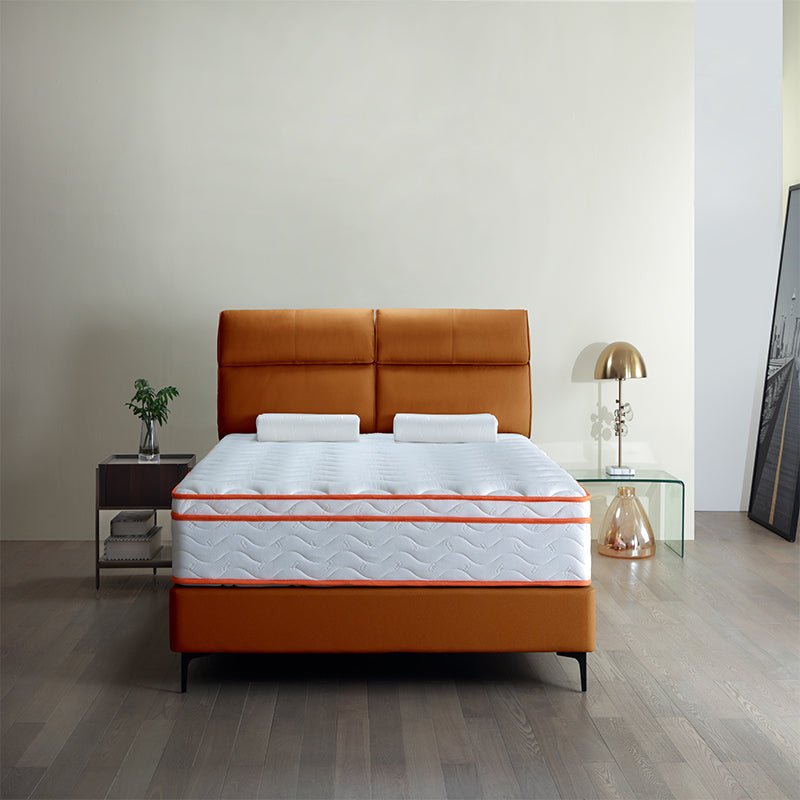 Queen hybrid mattress by Anthony & Home featuring memory foam and supportive coil system on a neatly made bed.