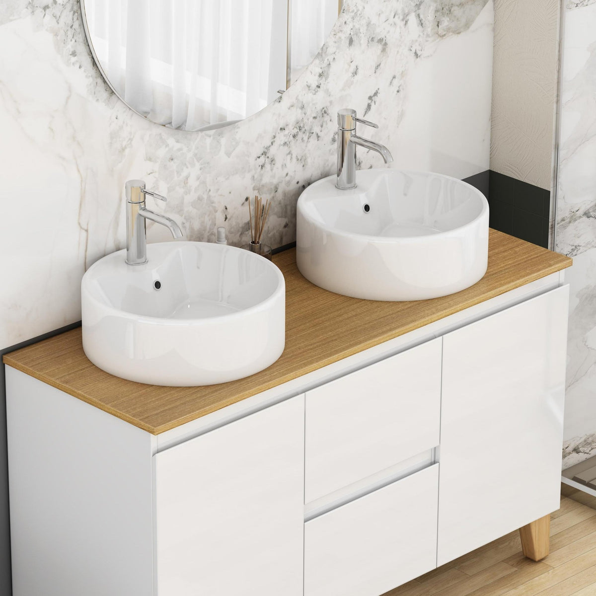Glossy white round ceramic vessel sink for bathroom by Anthony & Home, showing smooth, shiny surface and contemporary design.