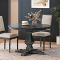 Round dining table by Anthony & Home with solid wood and MDF in espresso charcoal finish, part of limited edition exclusive collection.
