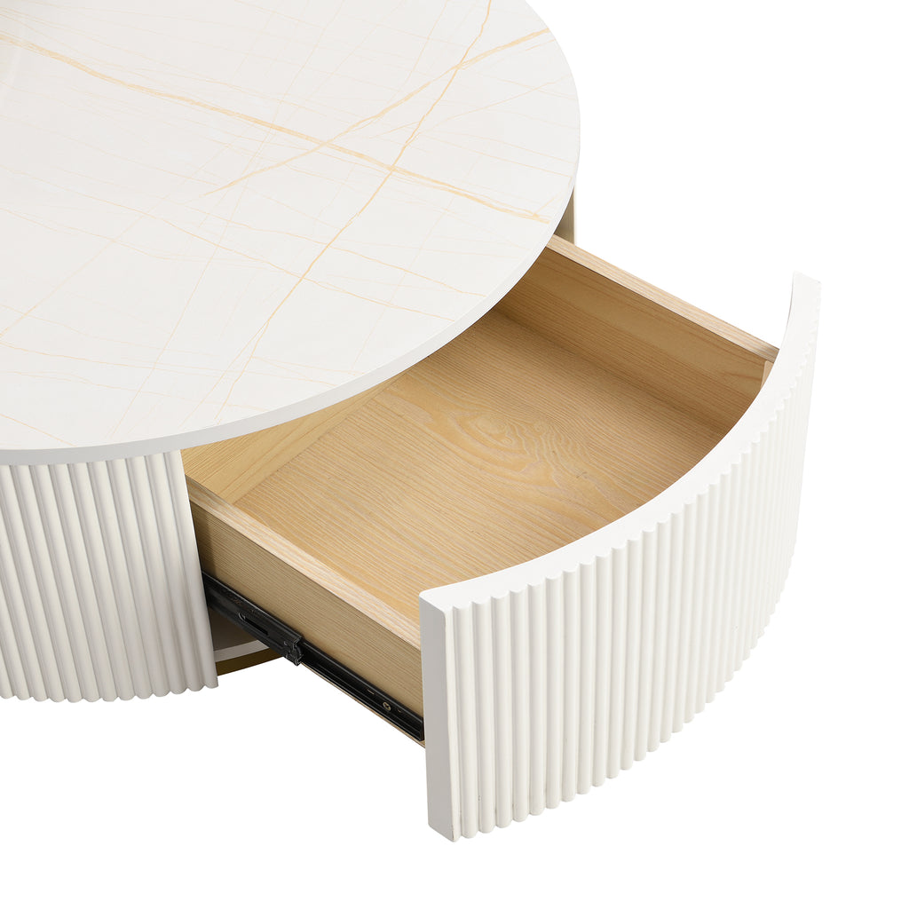 Round nesting coffee table with white gloss top and gold fluted base from Anthony & Home Signature Collection.