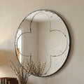 Brushed brass round wall mirror by Anthony & Home with sleek modern design, showcasing a stylish contemporary decor accent.