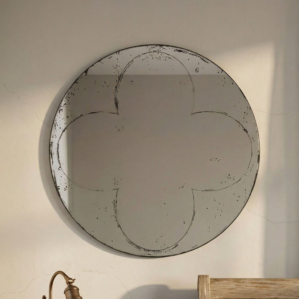 Round wall mirror with brushed brass finish from the Atelier collection by Anthony & Home, showcasing a sleek, modern design.