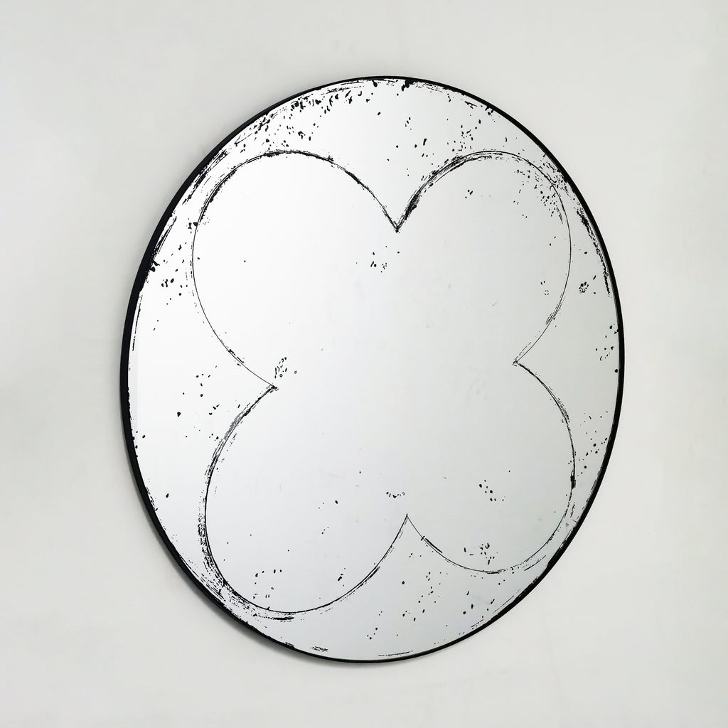 Brushed brass round wall mirror from Atelier collection by Anthony & Home, showcasing a sleek, modern design with a smooth circular frame.
