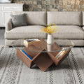 Round walnut coffee table with glass top and geometric art deco base from Anthony & Home's Atelier Collection.
