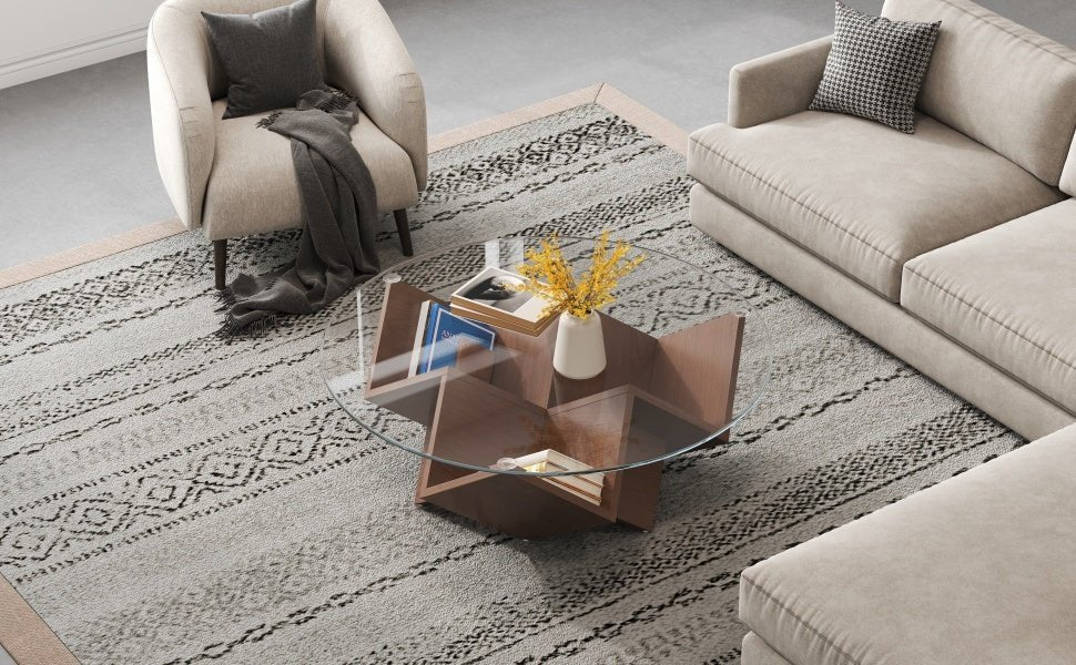 Round walnut coffee table with glass top and geometric Art Deco base from Anthony & Home's Atelier Collection.
