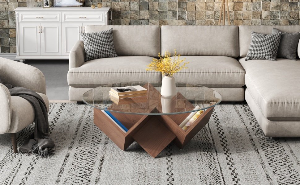 Round walnut coffee table with glass top and geometric Art Deco base from Anthony & Home's Atelier Collection.