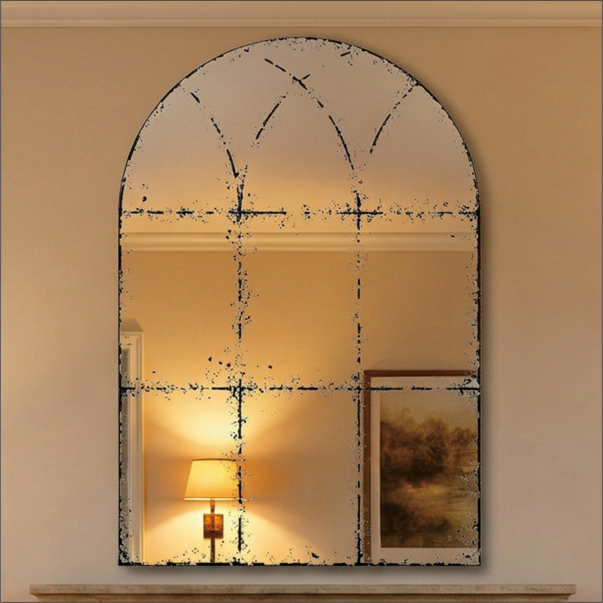Semicircular wall-mounted mirror with brushed brass finish, suitable for living rooms, by Anthony & Home.