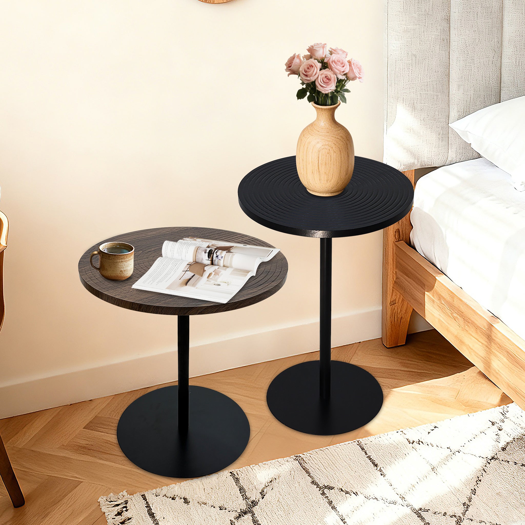 Set of 2 walnut round side tables with black metal pedestal bases, featuring a concentric design from Anthony & Home Atelier Collection.
