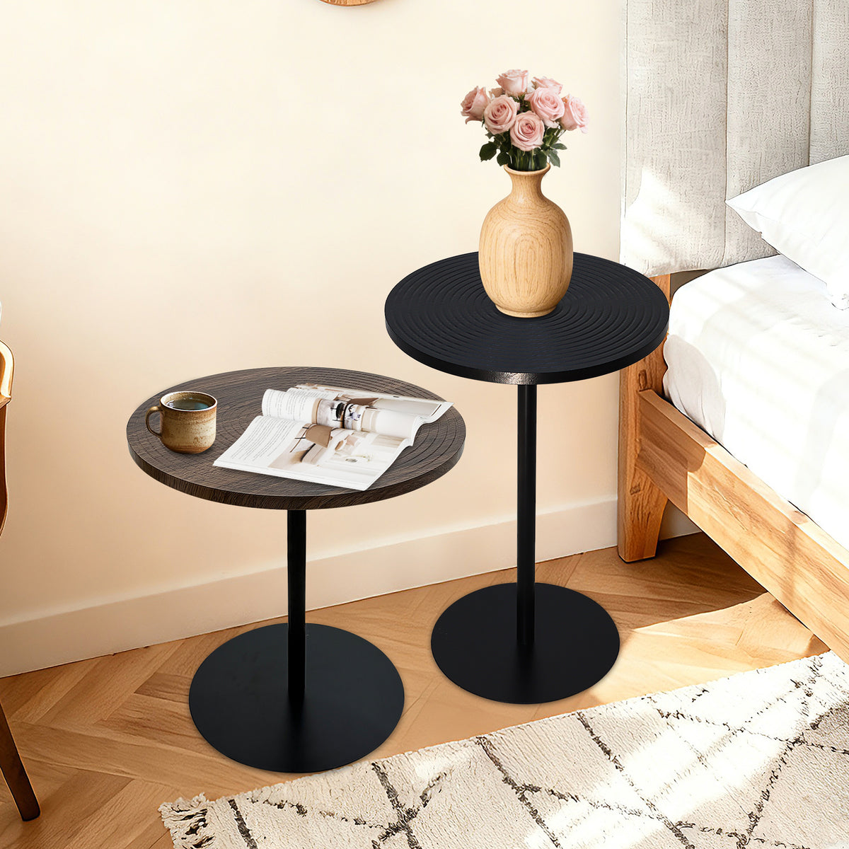 Set of 2 walnut round side tables with black metal pedestal bases, featuring a concentric design from Anthony & Home Atelier Collection.