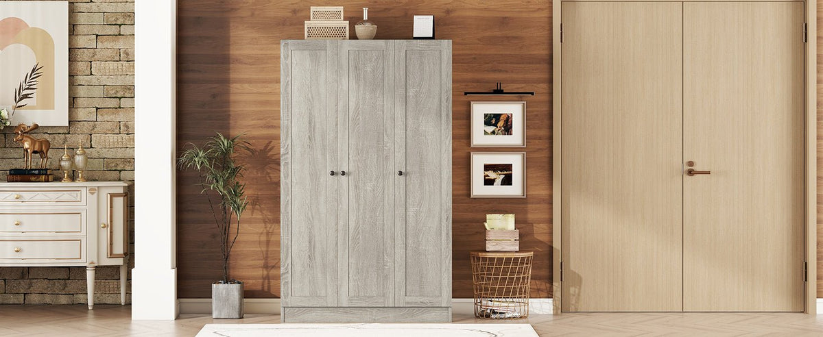 Gray three-door wardrobe from the Shutter Collection by Anthony & Home, featuring a sleek modern design with clean lines.