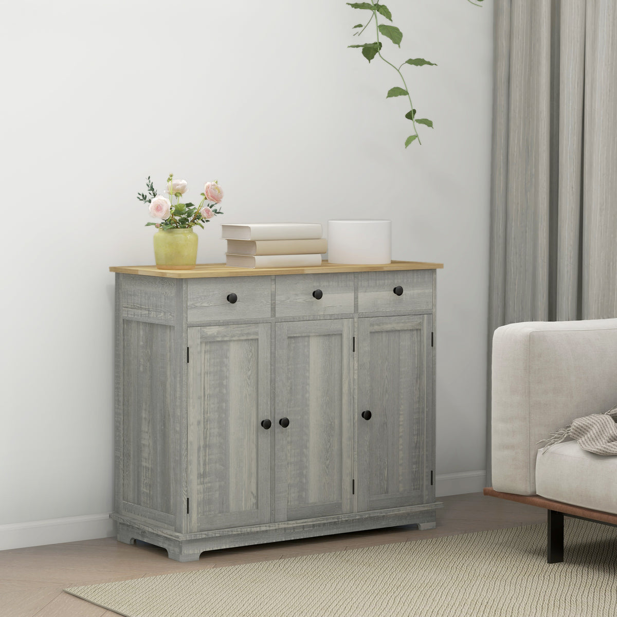 Distressed light gray sideboard with solid wood countertop by Anthony & Home, showcasing storage drawers and cabinet doors.