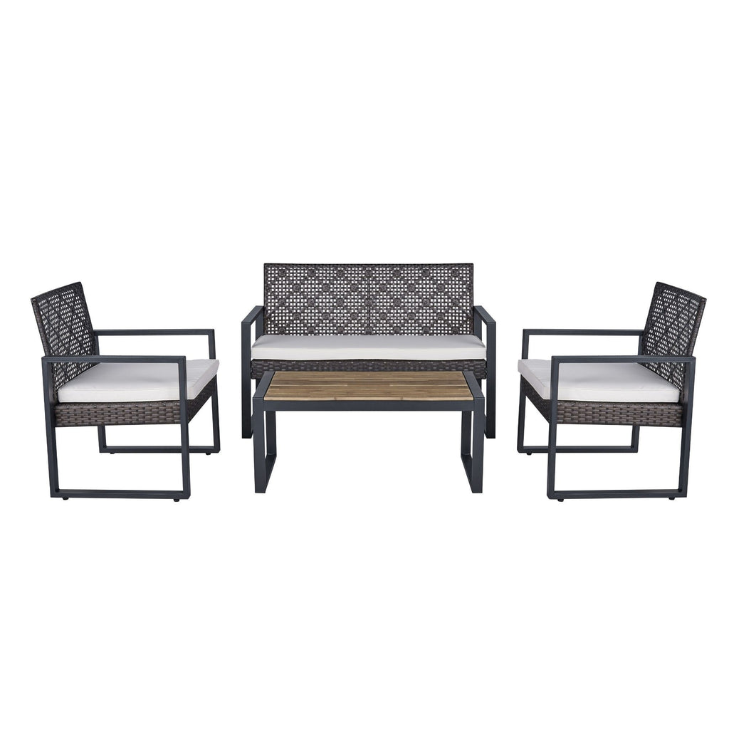Anthony & Home Signature acacia wood outdoor patio set with beige cushions, featuring a table and matching chairs for outdoor dining.