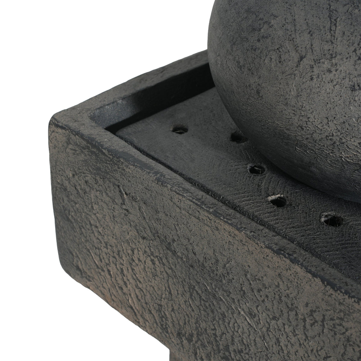 Anthony & Home Signature Concrete Column Fountain with integrated lighting, showcasing a stylish outdoor water feature in a garden setting.