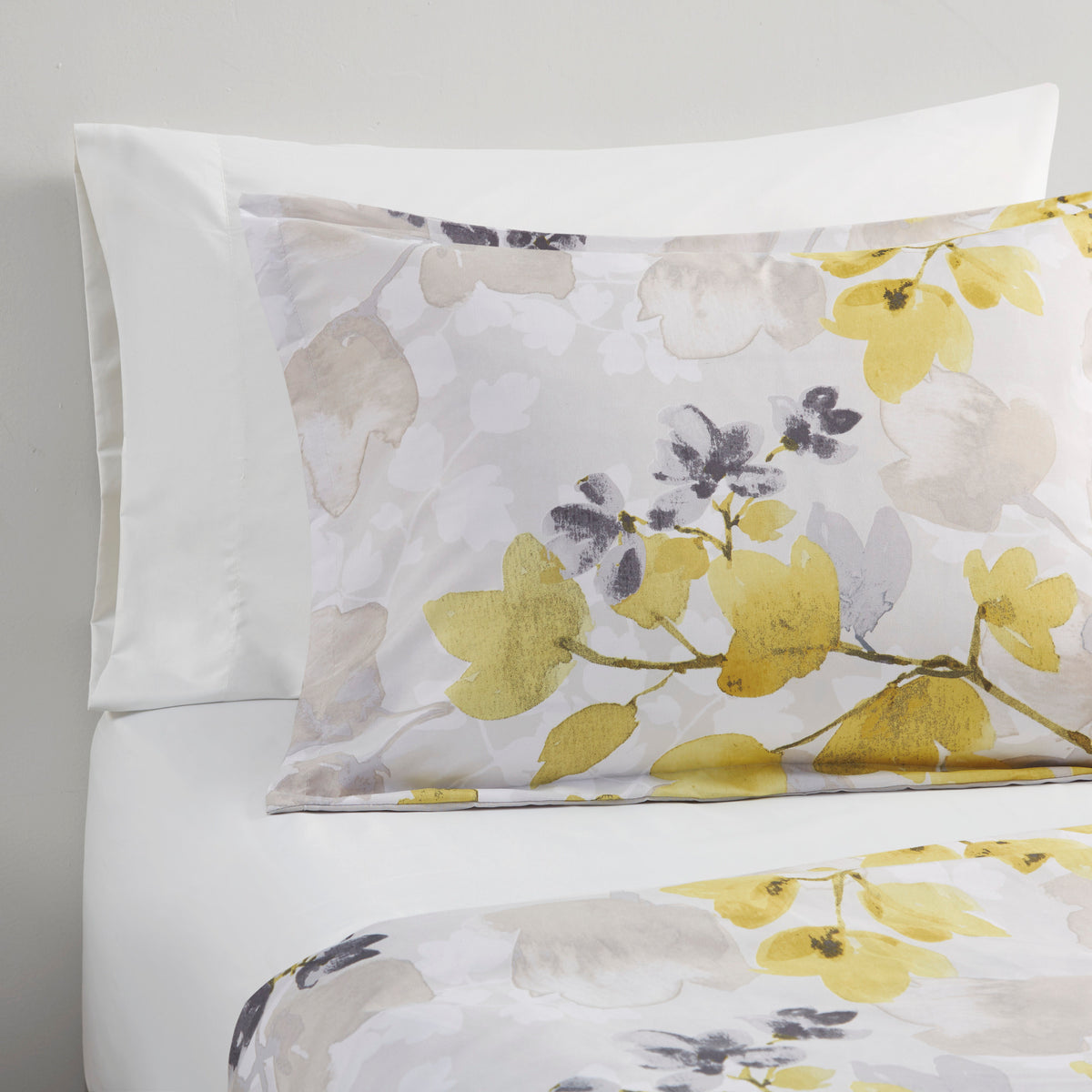 Anthony & Home signature leaf print polyester queen comforter set with leafy design on soft fabric, neatly arranged on a bed.