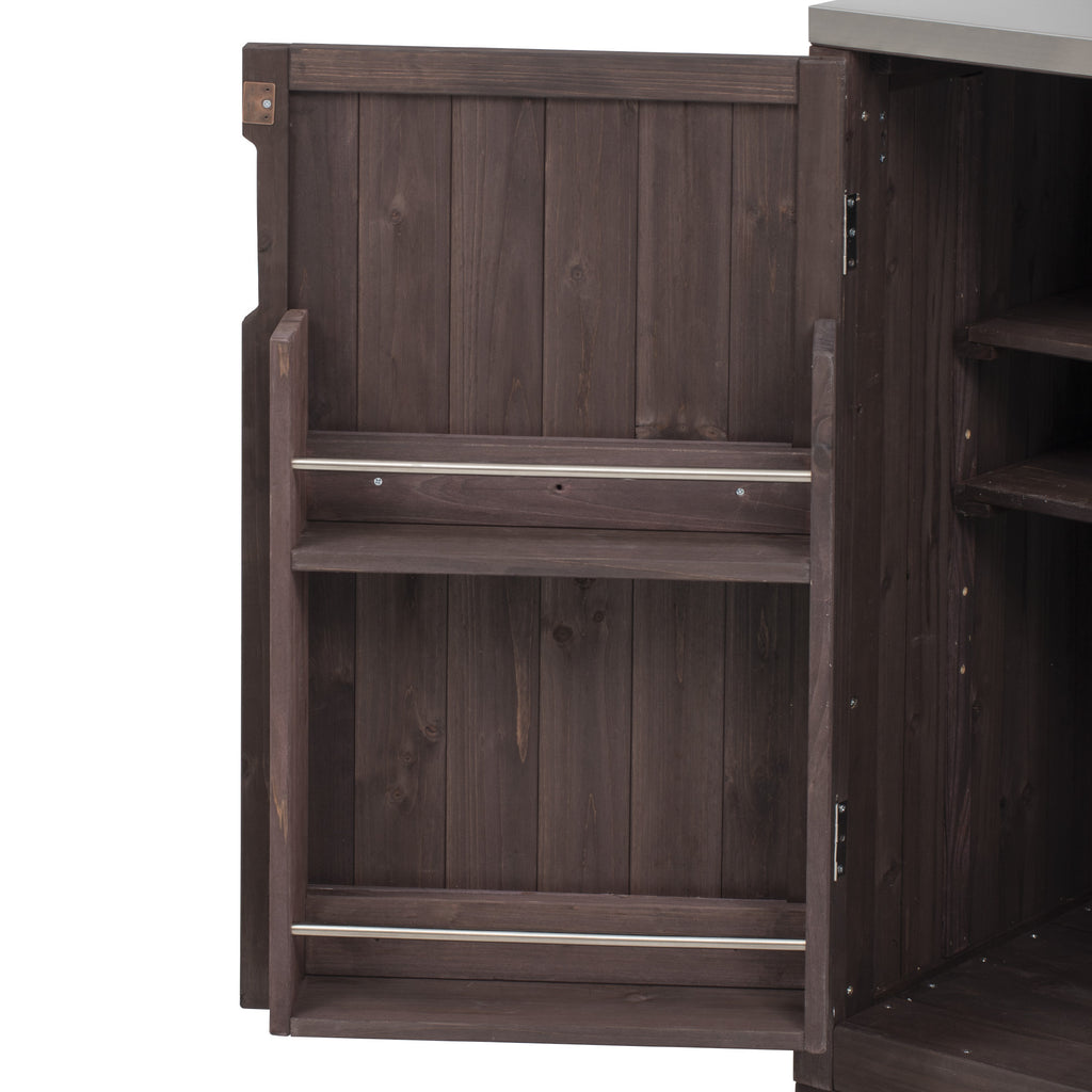 Outdoor kitchen island by Anthony & Home with stainless steel top, featuring built-in prep space and modern design.
