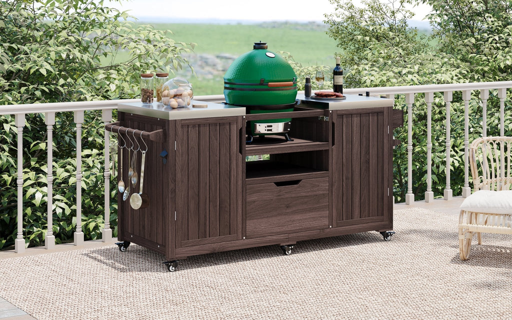 Outdoor kitchen island with stainless steel top by Anthony & Home, featuring built-in prep space and storage.