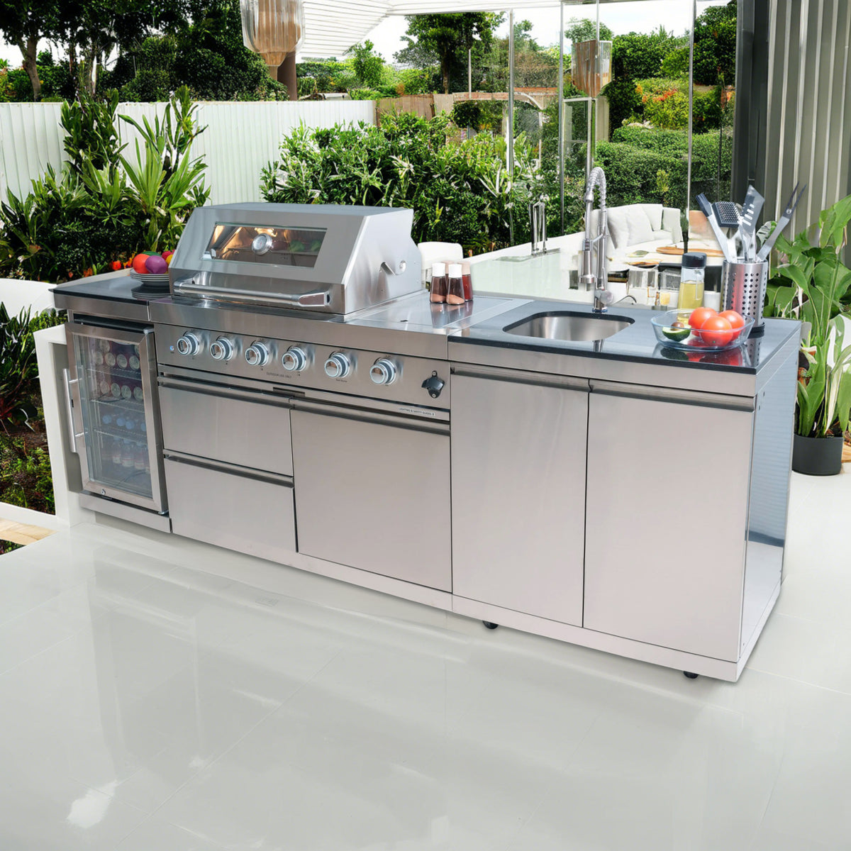 Anthony & Home Signature stainless steel outdoor kitchen island with built-in countertops and storage, ideal for outdoor cooking spaces.