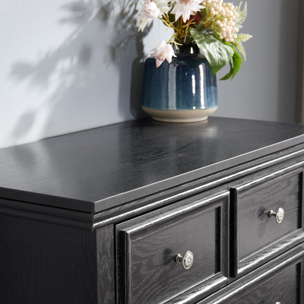 Six-drawer black MDF veneer dresser from Anthony & Home Studio Collection, modern farmhouse style with sleek design and craftsmanship.