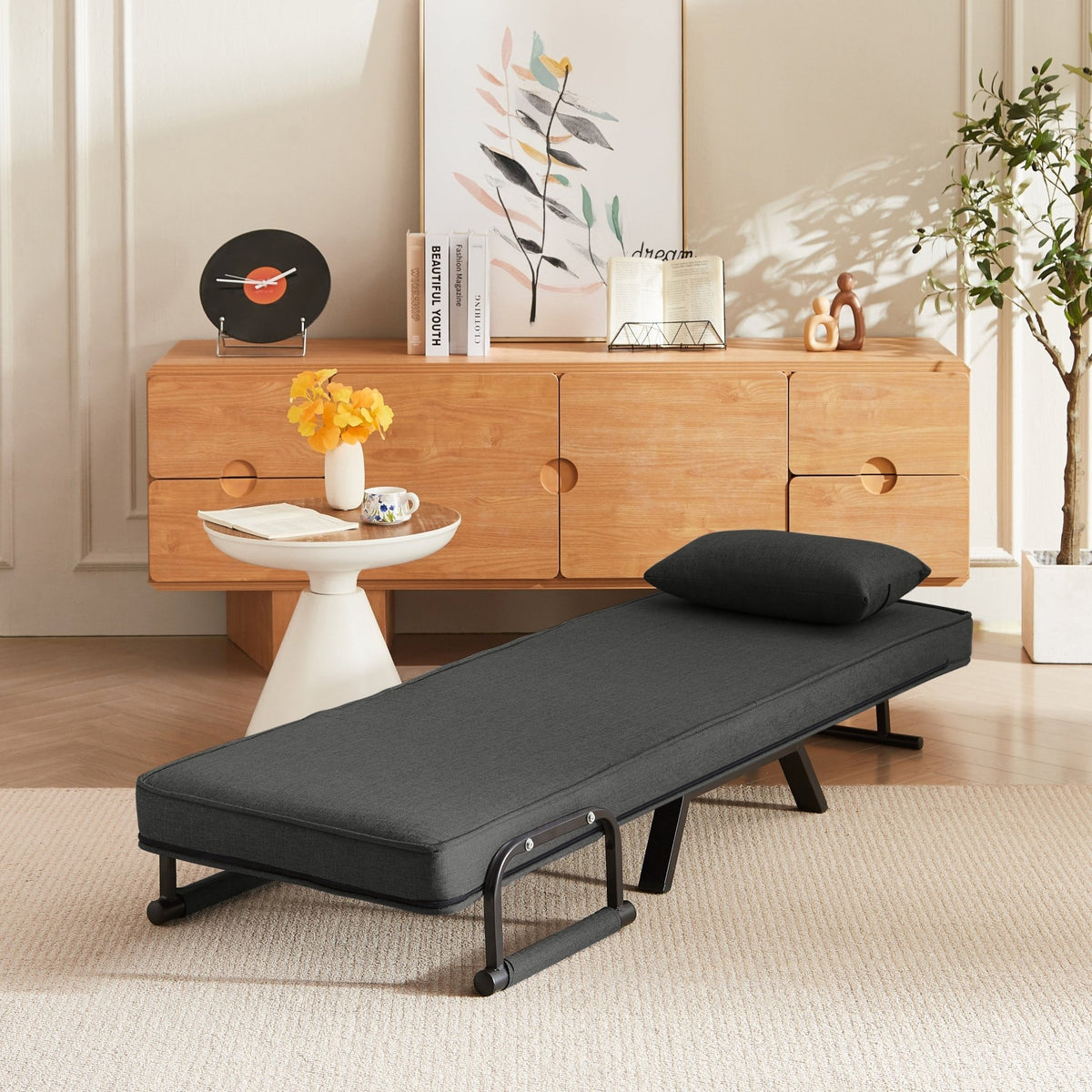 Black linen sleep chair bed in five-position limited edition by Anthony & Home, showcasing its sleek, adjustable design.
