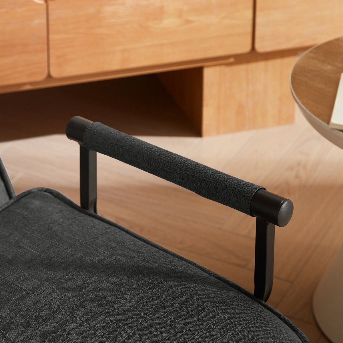 Black linen Sleep Chair Bed in 5-position design by Anthony & Home, showcasing its versatile, comfortable lounging and sleeping features.