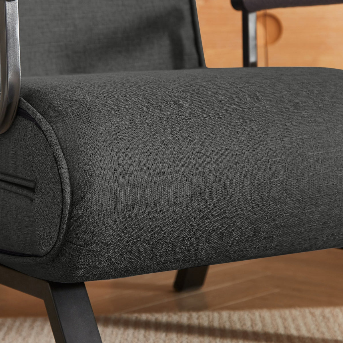 Black linen sleep chair bed by Anthony & Home in a 5-position limited edition, featuring a sleek and comfortable design.