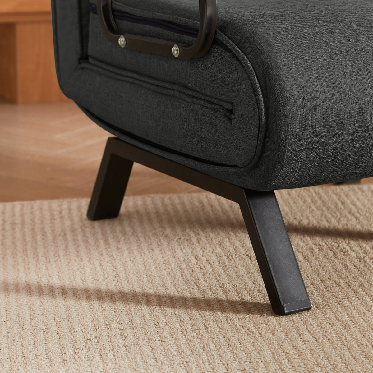 Black linen sleep chair bed by Anthony & Home in a 5-position limited edition, shown in its relaxed, reclined position.
