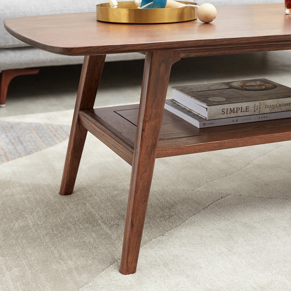 Solid oak center table by Anthony & Home featuring a polished rectangular surface and sturdy wooden legs.