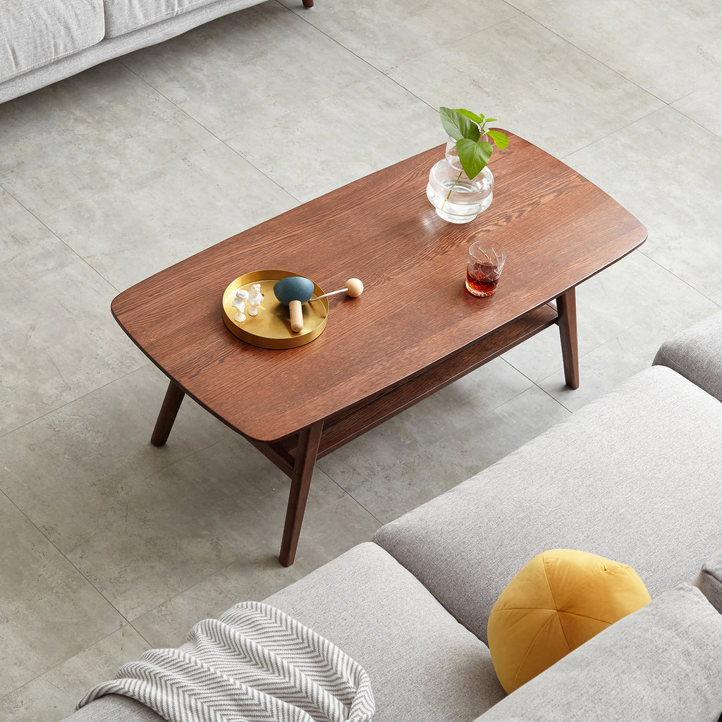 Solid oak center table from Anthony & Home with a natural wood finish and sturdy rectangular design.