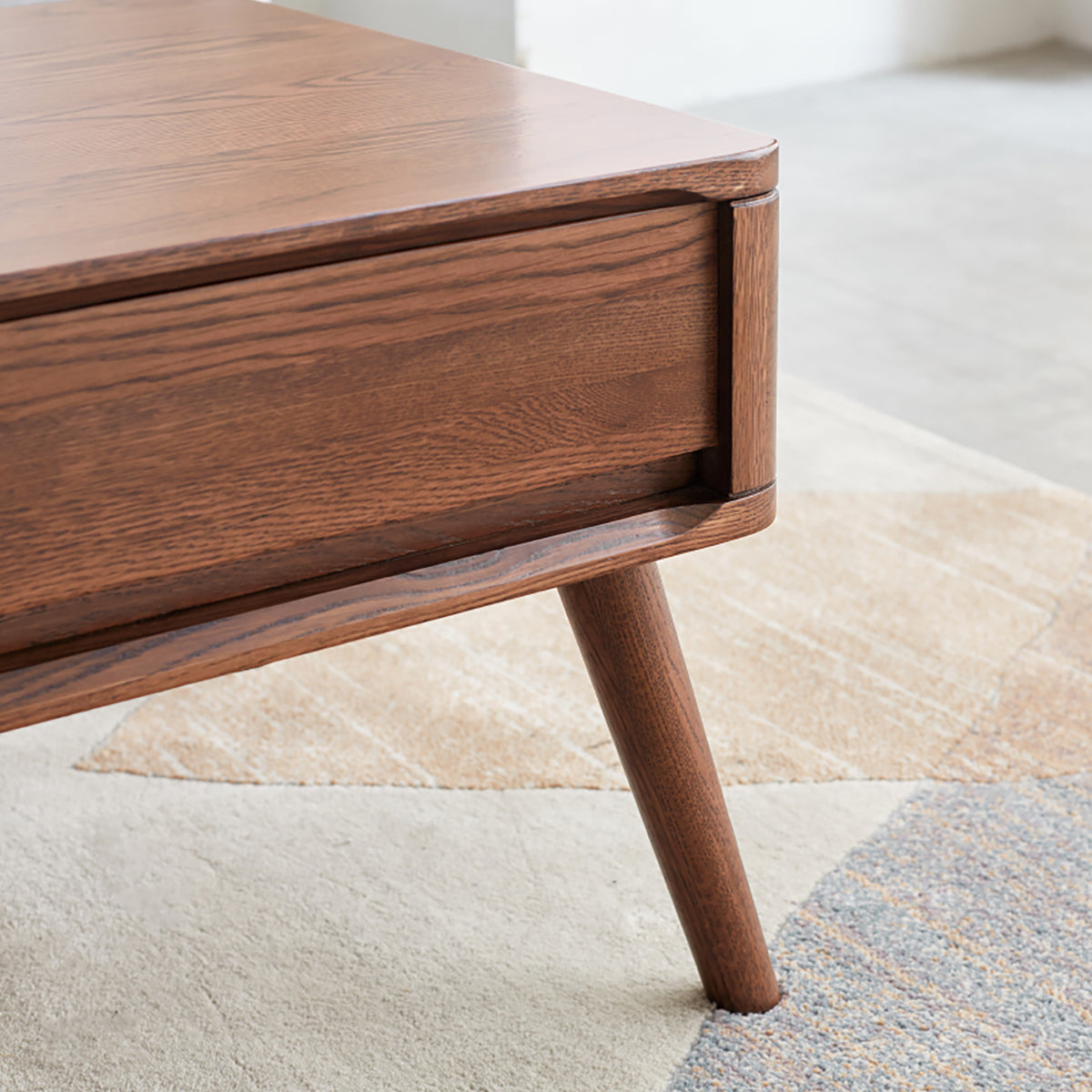 Solid oak center table from Anthony & Home with lift-top design and hidden storage shelf in the Atelier Collection.