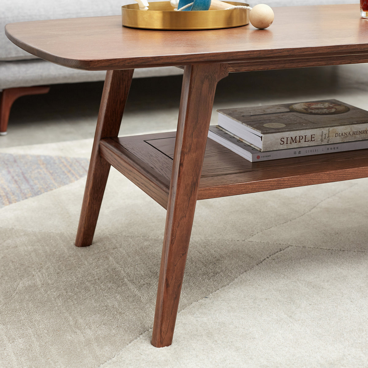 Solid oak coffee table with shelf in walnut finish from Anthony & Home Heritage Collection, showcasing a sturdy design and warm wood tones.