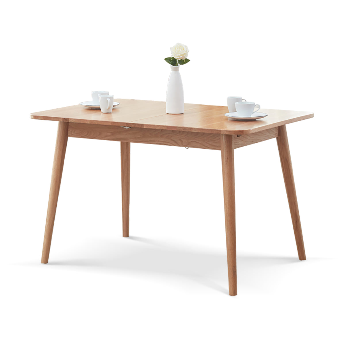 Solid oak extendable dining table by Anthony & Home with a sleek, natural finish and adjustable length for versatile dining space.