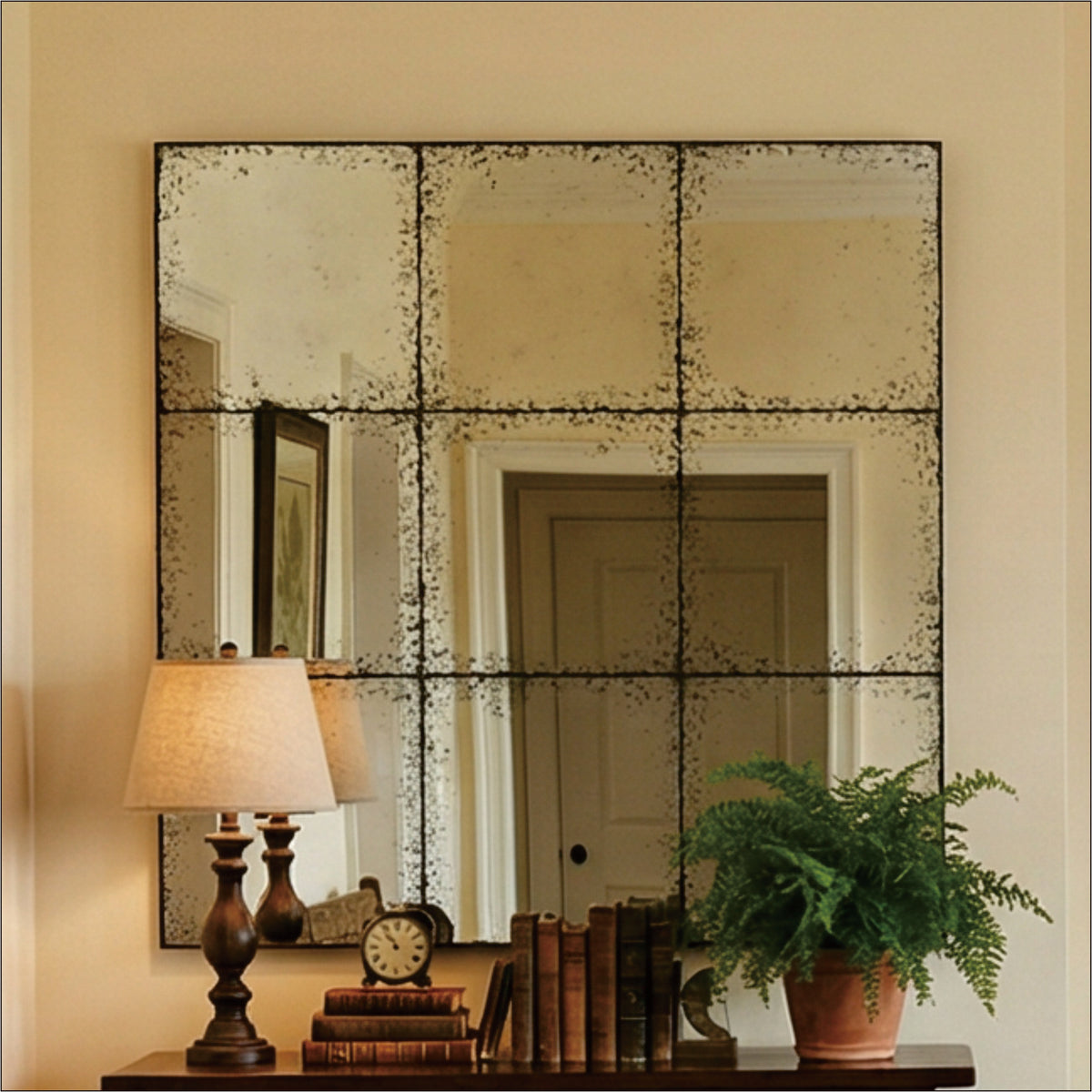 Square wall mirror from the Atelier Collection by Anthony & Home, featuring a sleek frame and modern design.