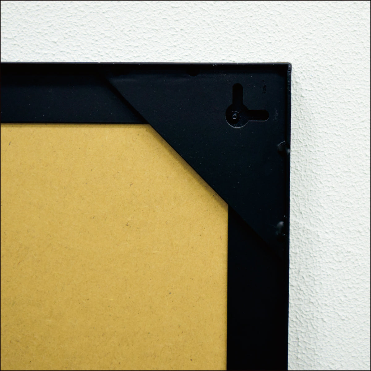 Square wall mirror from Anthony & Home's Atelier Collection with a sleek frame, ideal for modern interior decor.