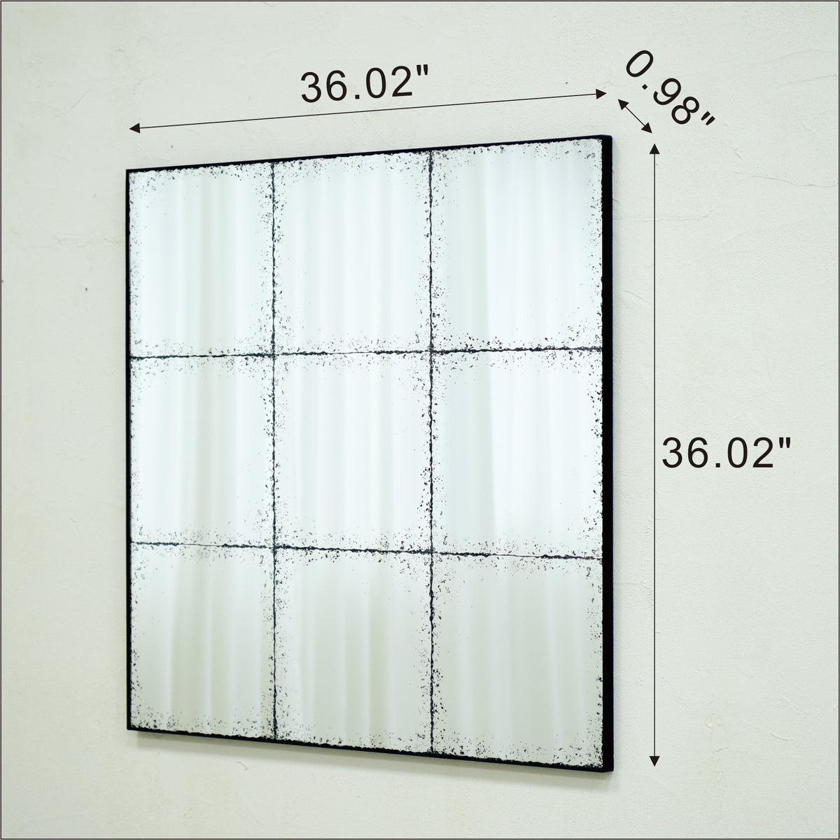 Square wall mirror from Anthony & Home's Atelier Collection with a sleek frame, perfect for modern interior decor.
