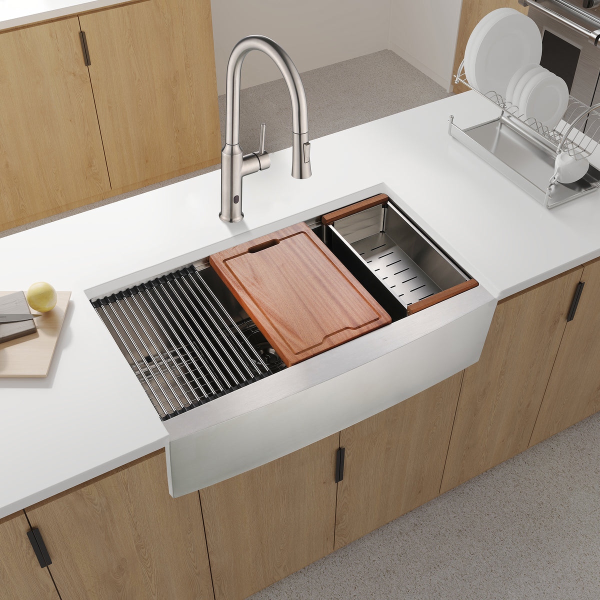 Stainless steel farmhouse kitchen sink with workstation and apron front by Anthony & Home, showing durable, sleek design and spacious basin.