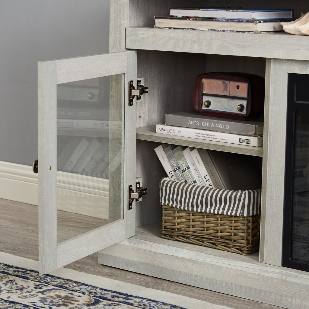 Stone gray finish Studio TV media console with built-in fireplace from Anthony & Home, featuring a sleek modern design and storage compartments.