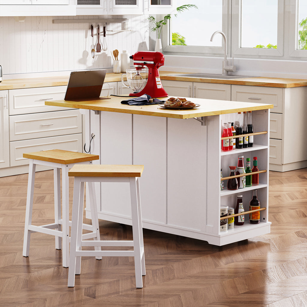 White Anthony & Home kitchen island with drop leaf, bar stools, power outlet, and storage cart in a modern kitchen setting.