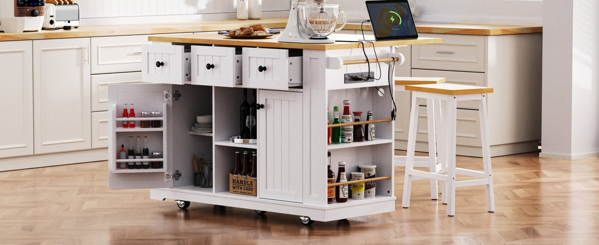 White MDF kitchen island with drop leaf, bar stools, built-in power outlet, and storage cart from Anthony & Home.