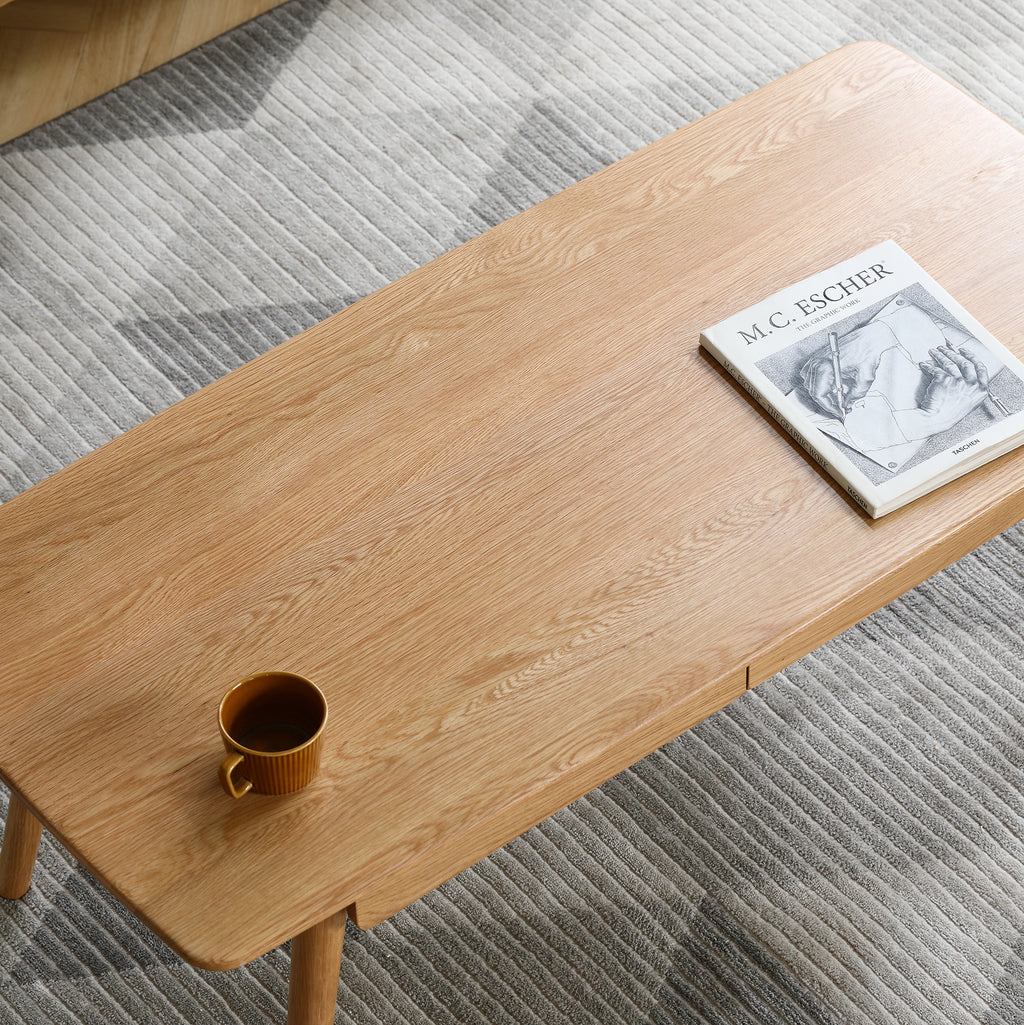 Studio solid oak center table with storage drawers by Anthony & Home, showcasing a modern design and natural wood finish.