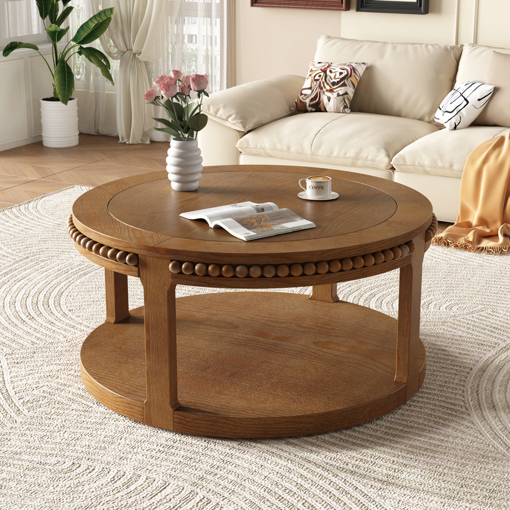 Anthony & Home Studio Walnut Round Coffee Table with solid wood construction and two-tier design, showcasing a modern living room style.