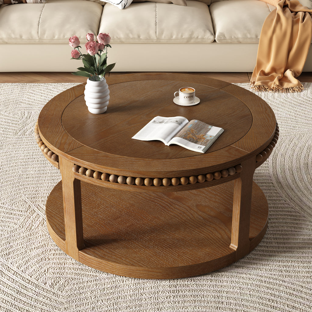 Anthony & Home Studio Walnut round coffee table with solid wood construction and two-tier design, showcasing a stylish living room setup.