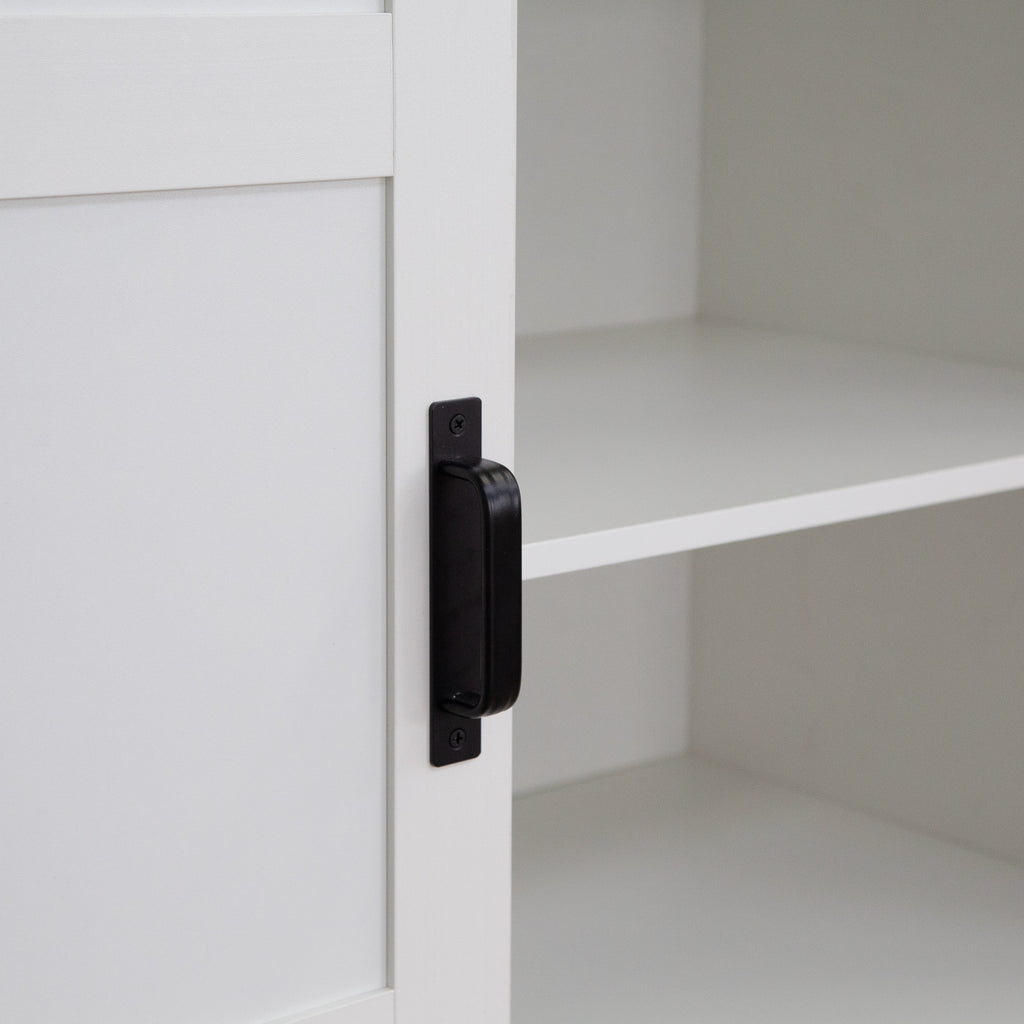 Tall Anthony & Home armoire with sliding barn door, featuring wood finish and spacious interior storage.