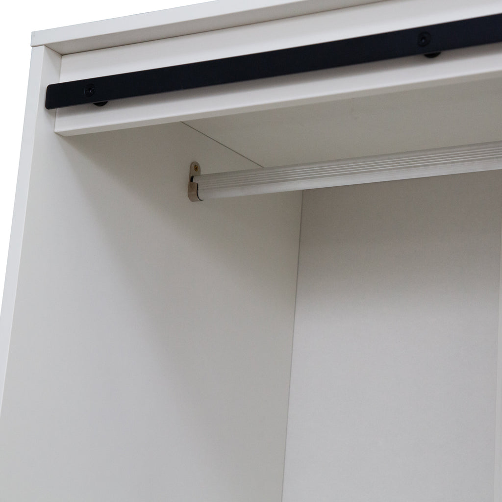 Tall Anthony & Home armoire with barn door featuring sleek wooden finish and modern hardware, ideal for bedroom or living space storage.