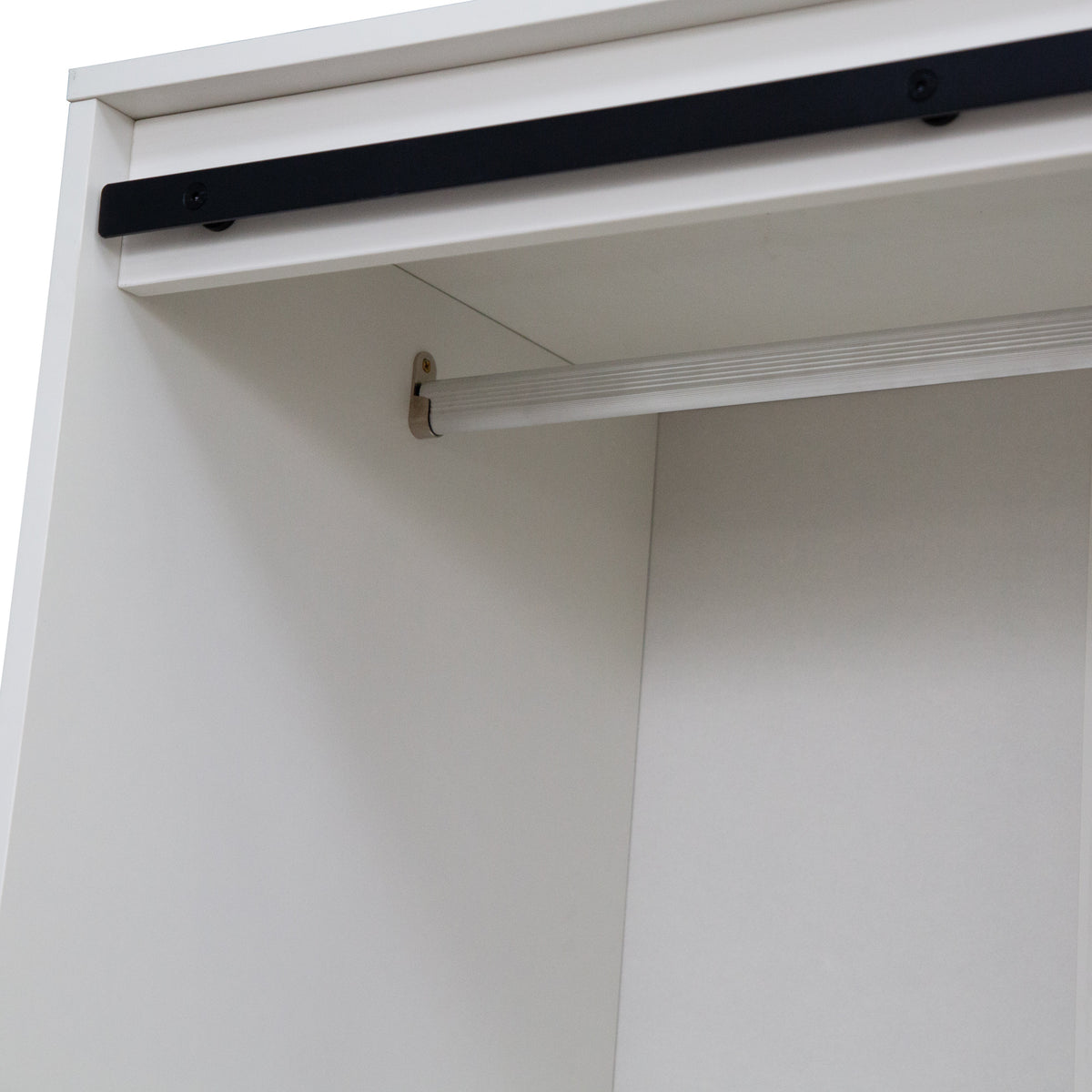 Tall Anthony & Home armoire with barn door featuring sleek wooden finish and modern hardware, ideal for bedroom or living space storage.