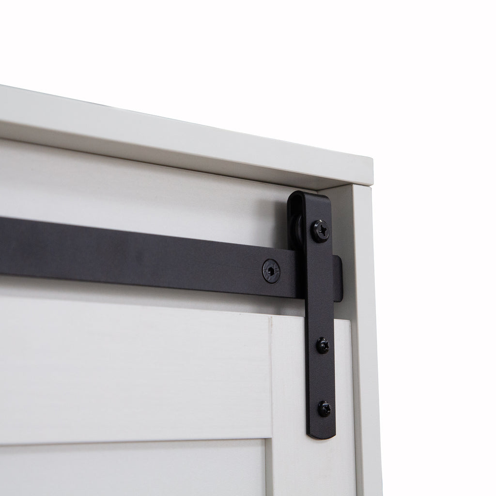 Tall Anthony & Home armoire with barn door featuring wood finish and sleek design, showcasing storage and rustic charm.